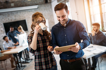 Portrait of architects having discussion in office