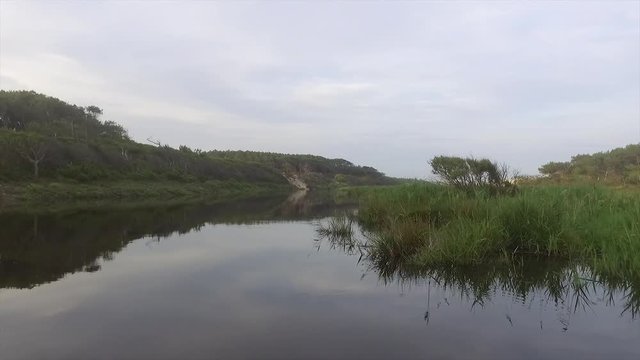 Flying over the Courant d'Huchet an france river near Moliets-et-maa