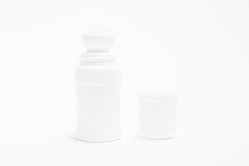 Deodorant bottle; roll-on for men and women on white background.