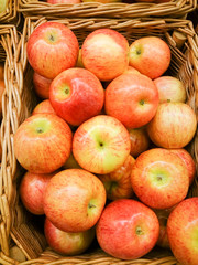 Many red apples in mall on sale closeup shot natural color image.