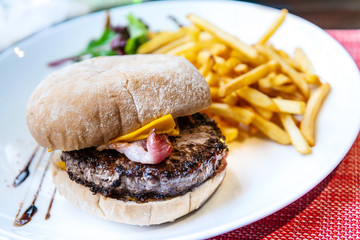Cheese burger - American cheese burger with Golden French fries