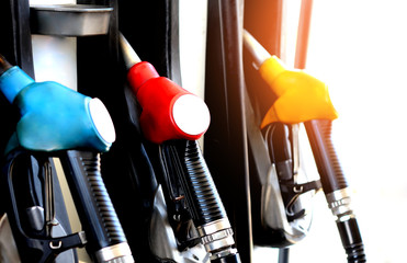 red green yellow orange color fuel gasoline dispenser  background energy crisis