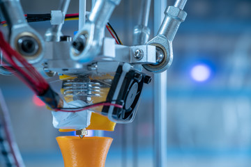 Print parts on a delta 3D printer in industrial lab