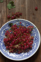 a bunch of ripe juicy small red currant berries