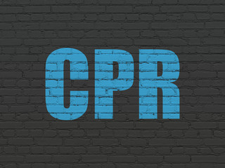 Obraz premium Medicine concept: Painted blue text CPR on Black Brick wall background