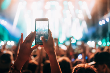 Portrait of happy crowd enjoying at music festival