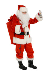 Santa Claus carry sack full of presents on his back and hand bell