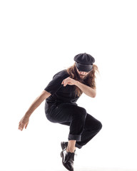 Young beautiful dancer posing in the studio