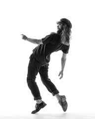 Young beautiful dancer posing in the studio