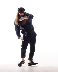 Young beautiful dancer posing in the studio