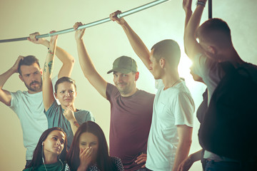 Sweaty armpits. Sweaty man. Bus. Public transport. The unhappy people near man