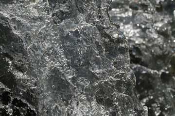 water splashes from the waterfall