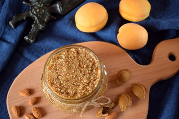 Urbech of apricot kernel in a glass jar. National Dagestani paste of nuts