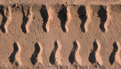 Horizontal seamless wheel trace, tire track on sand
