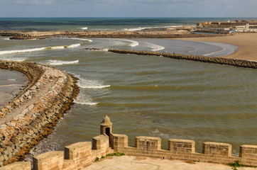 stone fouling in the mouth of the river, flowing into the ocean from the site of the fortress an amazing city in Morocco, Rabat, Kasbah des Oudaia