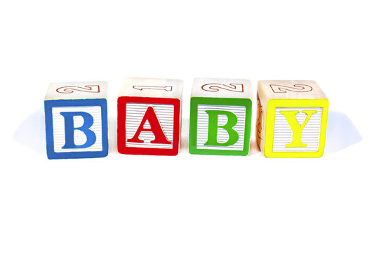 Colorful wooden blocks spell Baby