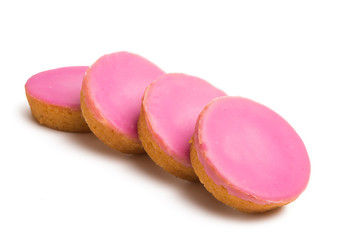Dutch biscuit in pink glaze isolated