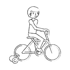 little boy in bicycle with auxiliary rims