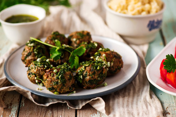 Chimichurri Whole Meatballs with Swiss Chard.