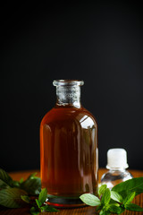 Mint syrup in a glass bottle