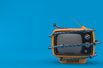 Old TV set with barbed wire