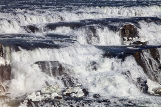The mighty currents of the Gullfoss waterfall