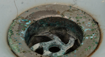 Dirty and corroded plug hole