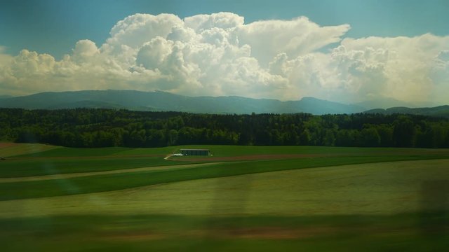 day time train side window pov panorama 4k switzerland

