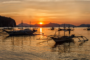  tropical landscape with traditional boats of the Philippines. Elnido, the island of Palawan.