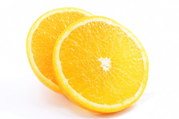 fresh orange slices on a white background