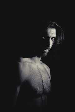 Muscular man looking away