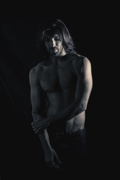 Muscular man looking away