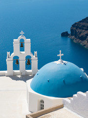 Blue dome and three bells of Fira
