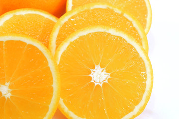 fresh orange slices on a white background
