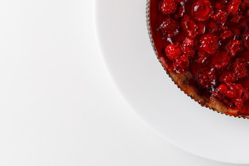 Raspberry jelly cake. Top view, flat, overhead. Copy space and text area. on white background