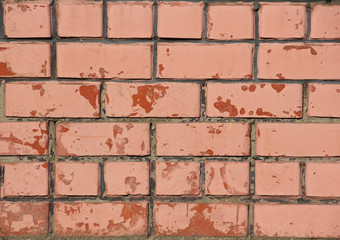 Old shabby red brick wall, background