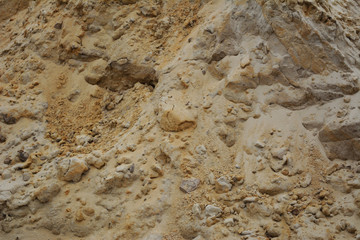 Sand texture from pile with grit and small stones.