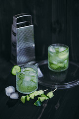 Homemade lime lemonade with cucumber. Cold beverage for hot summer day.