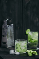 Homemade lime lemonade with cucumber. Cold beverage for hot summer day.