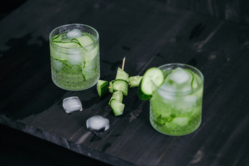 Homemade lime lemonade with cucumber. Cold beverage for hot summer day.