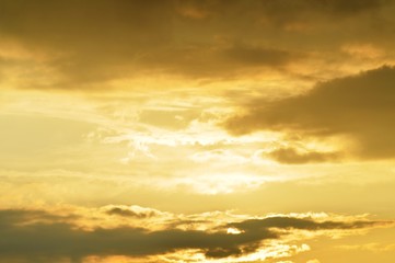 Naklejka na ściany i meble Sky with clouds and sunshine - sunset