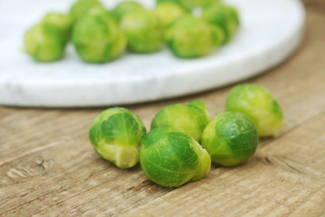 Healthy Food Brussel Sprout Cabbage isolated Rustic Wooden Background