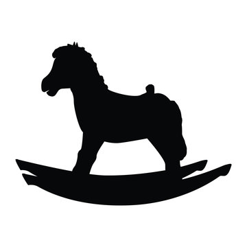 A black and white silhouette of a toy rocking horse