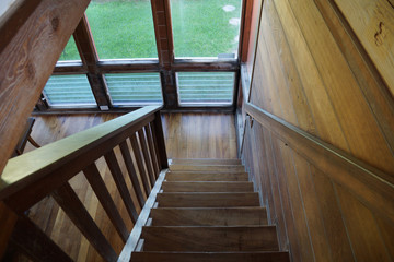 Wood Staircase leading downstairs