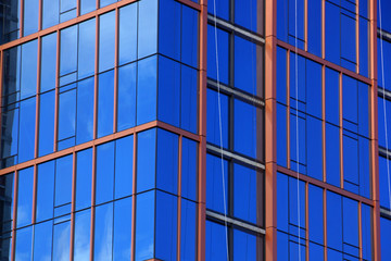 Fototapeta premium Blue Glass Windows reflect clouds