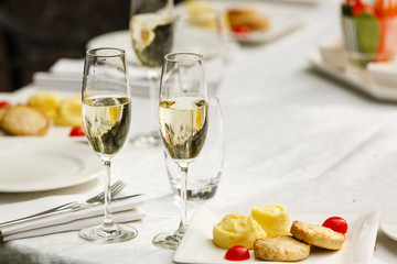 glasses with champagne on the table