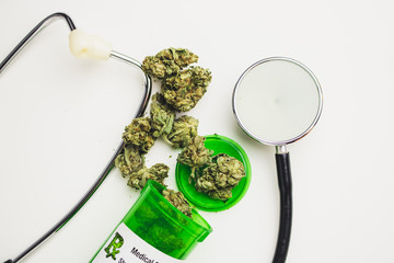 Medical Marijuana Prescription  - Medical Marijuana Flower & Stethoscope White Background