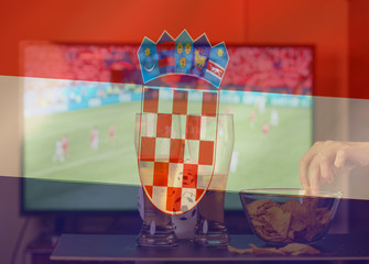 double exposure of croatian flag and cheering crowd