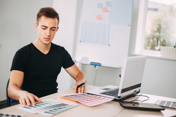 Professional colorist working with color palettes and graphic tablet. Design, innovations, creative work and new projects. Digital art, developing, media concept