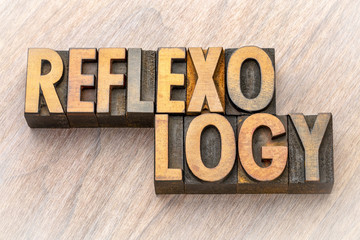 Fototapeta premium reflexology word abstract in wood type